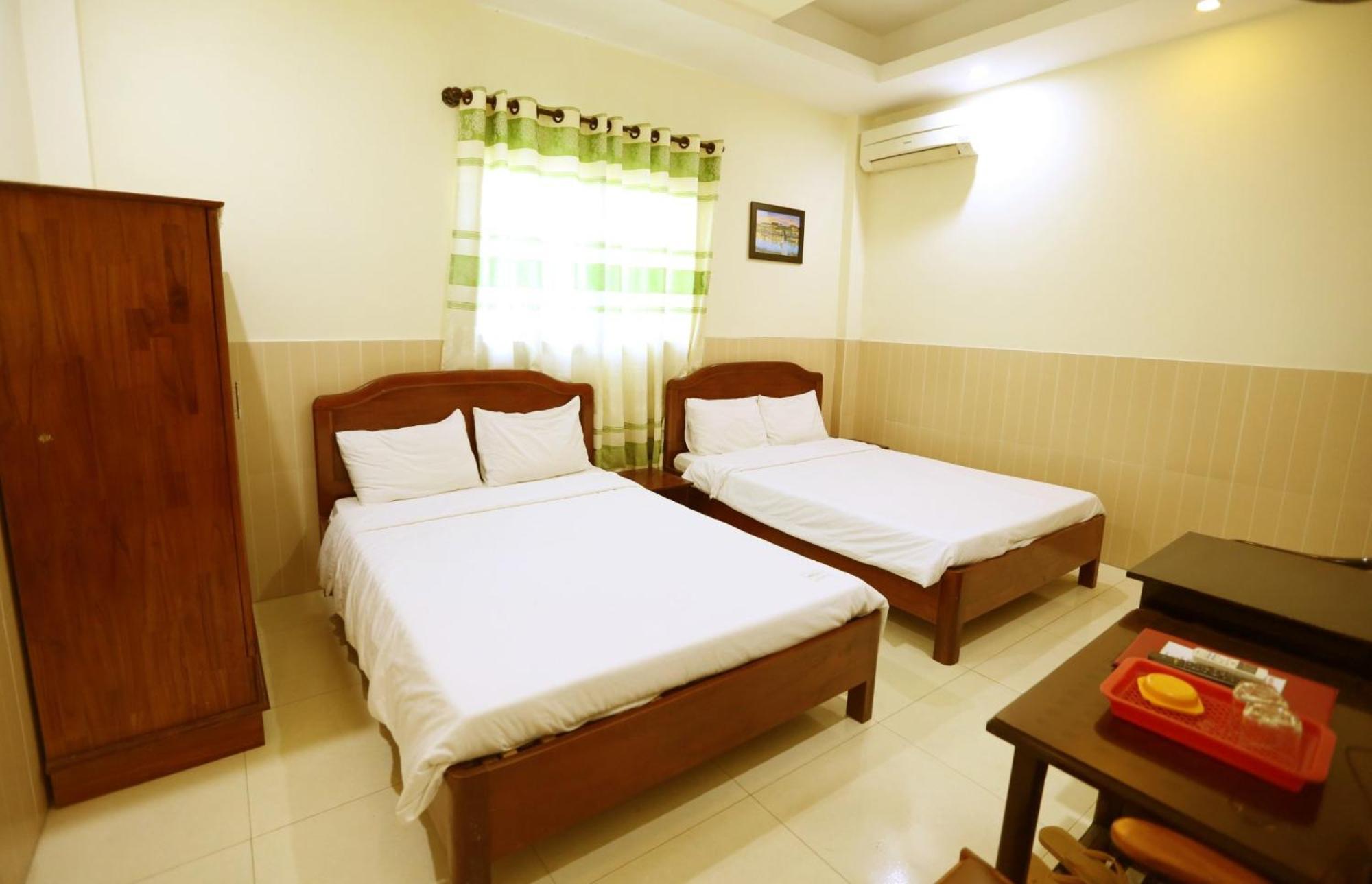 Minh Quang Hotel Хойан Экстерьер фото